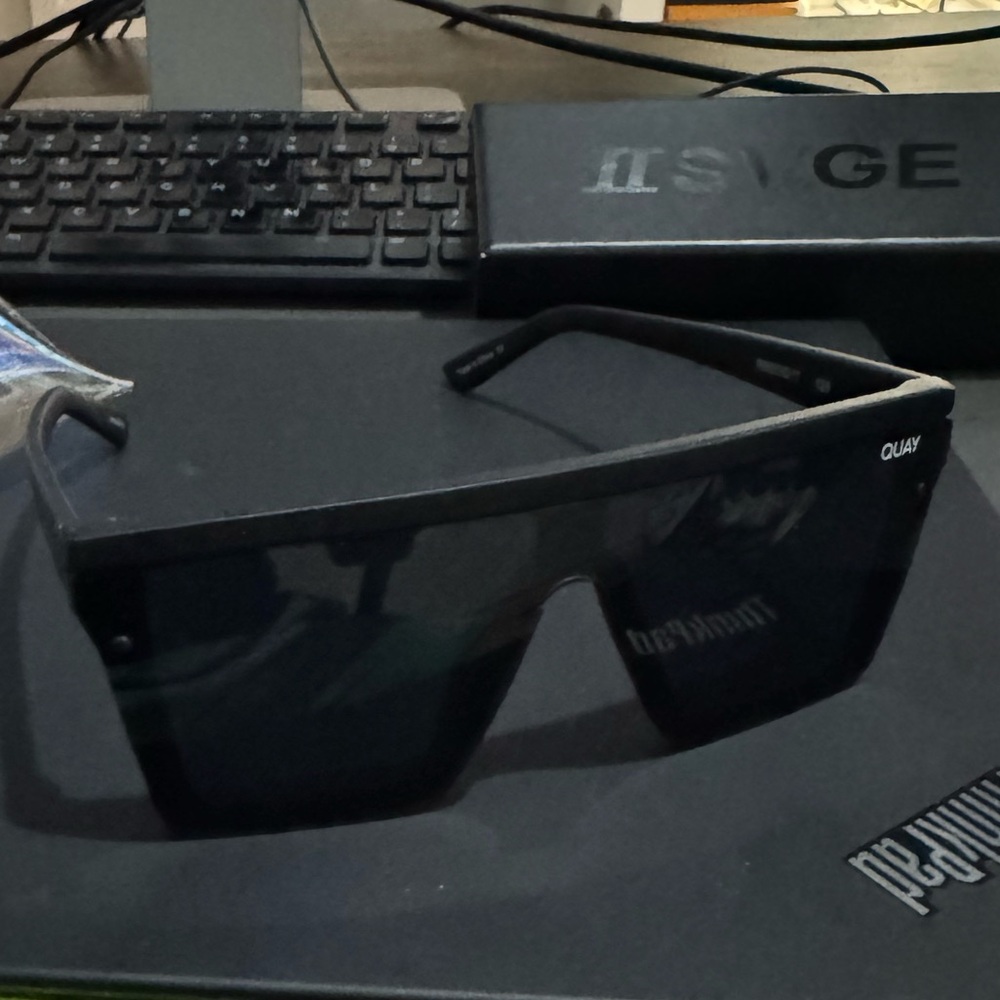 Quay sunglasses and case